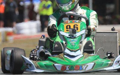 A green and white Sera kart number 96 on track with a camera mounted on the nose