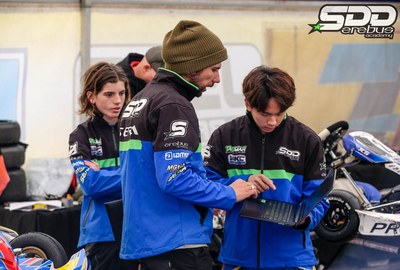 The SDD crew working on a kart in the paddock